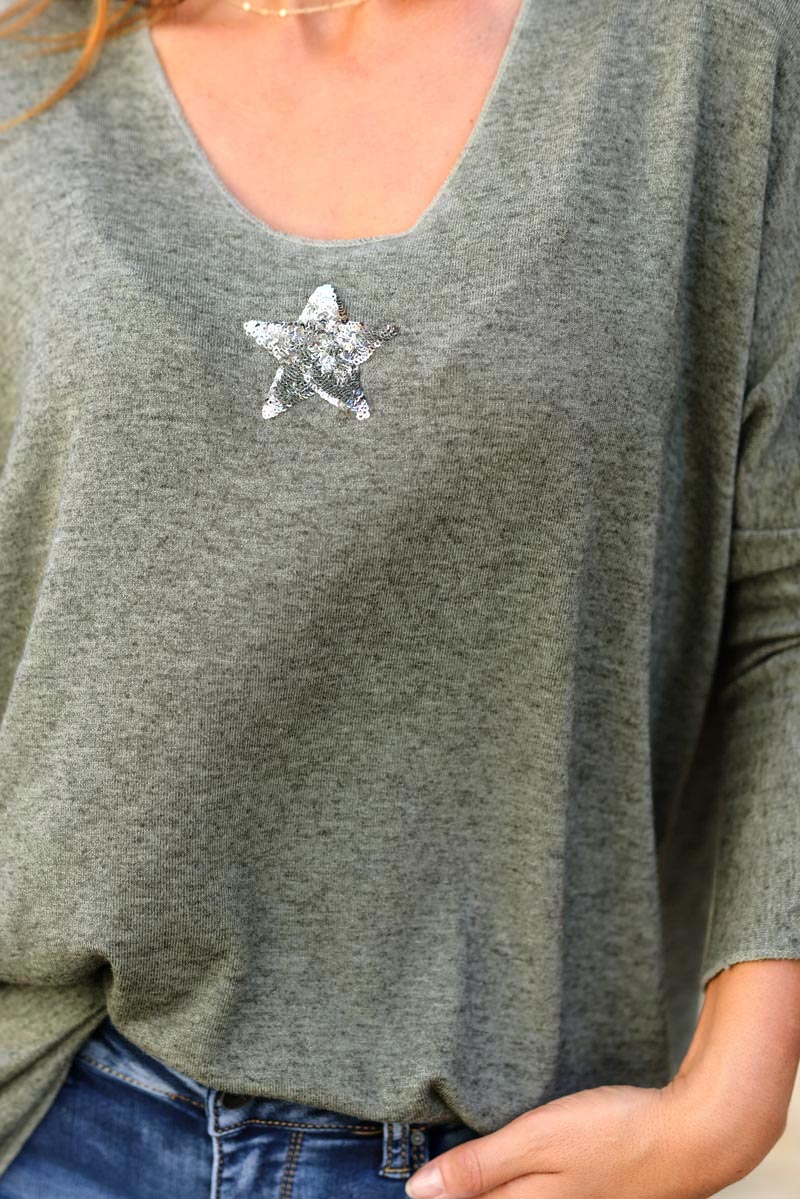 Khaki v-neck sweater with small sequin star
