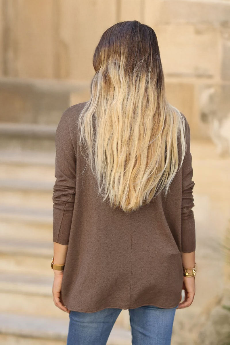 Brown v-neck sweater with small sequin star