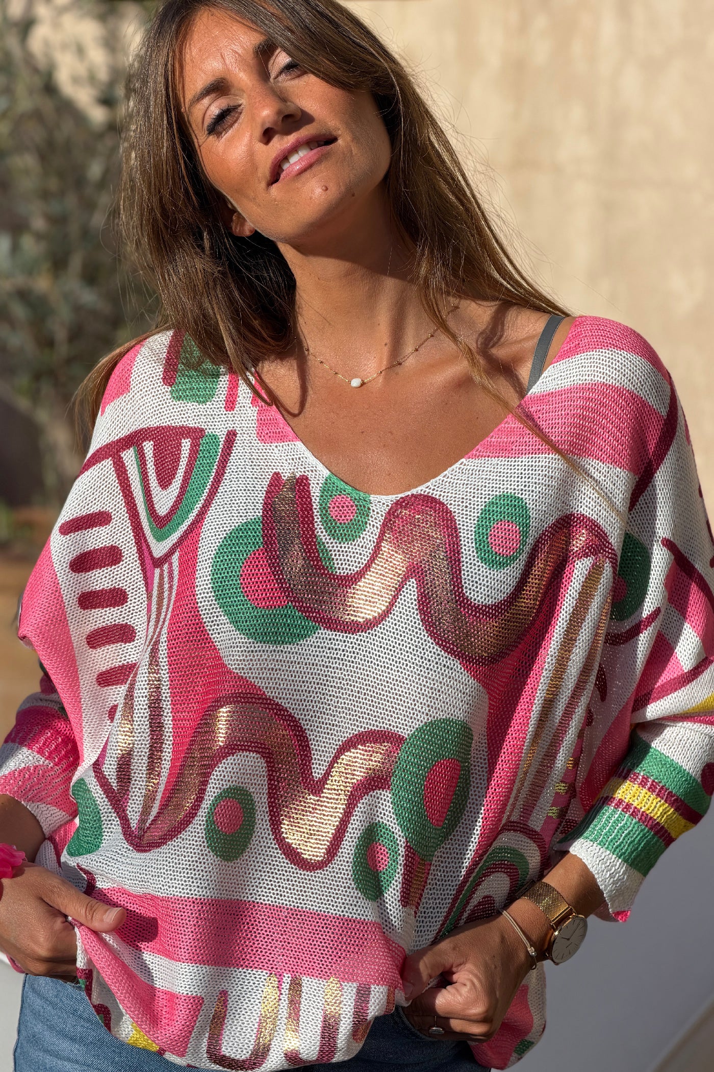 Pull petite maille imprime graphique abstrait tons rose manches chauve-souris