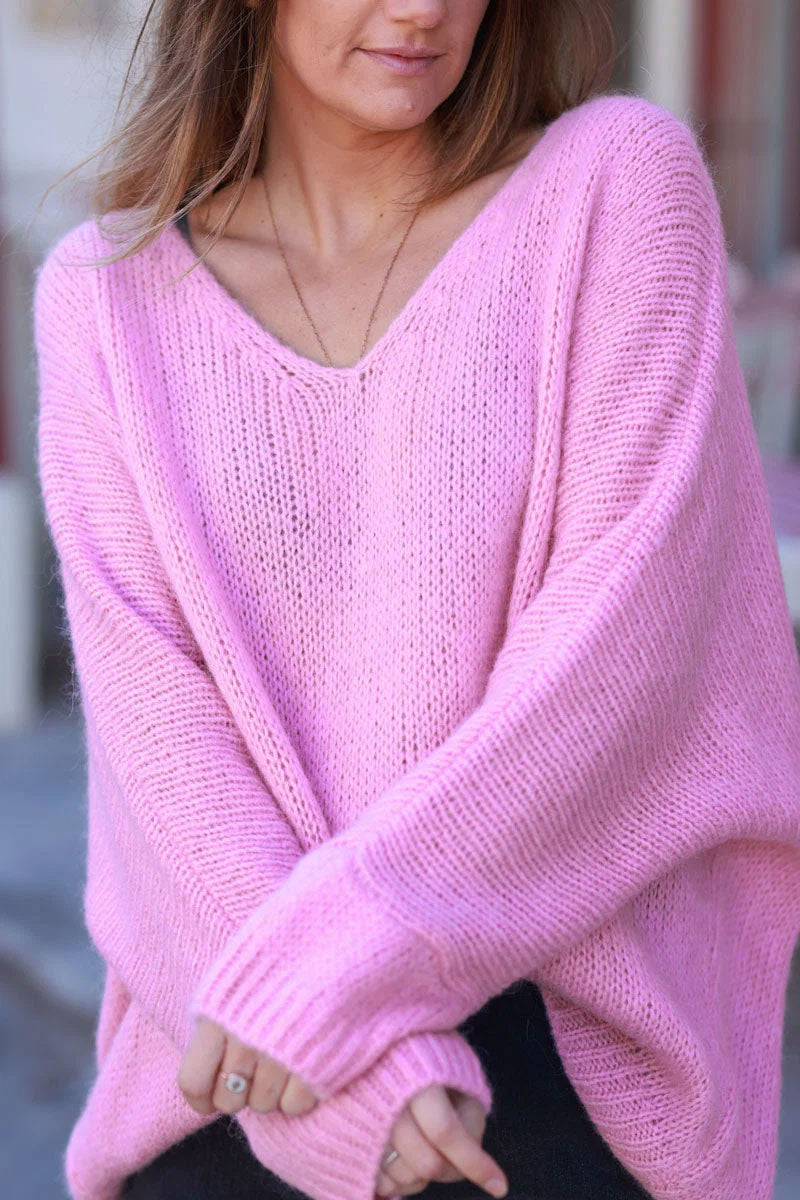 Pull rose en maille col v manches chauve souris