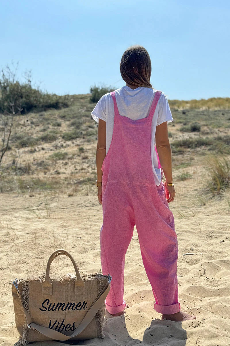 Peto fluido rosa, mitad algodón, mitad lino, con tirantes con lazo