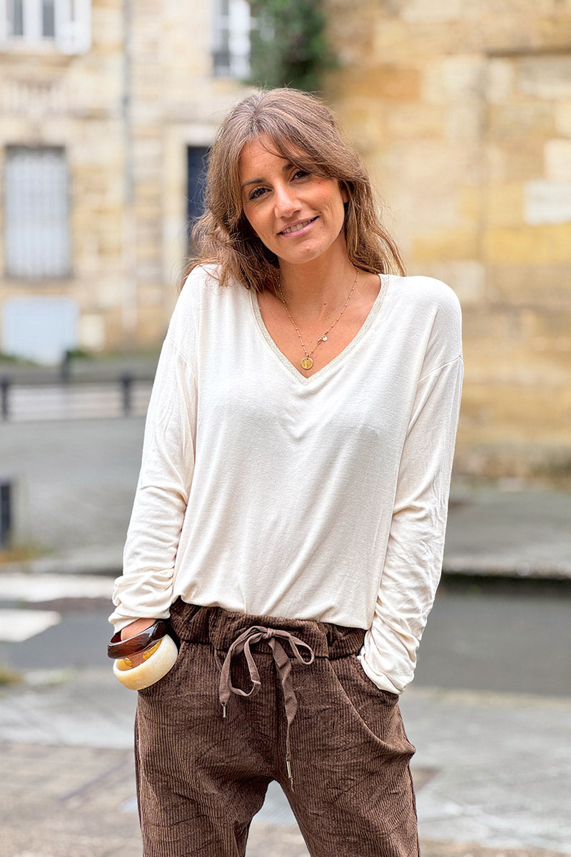 Top beige en jersey stretch col v brillant