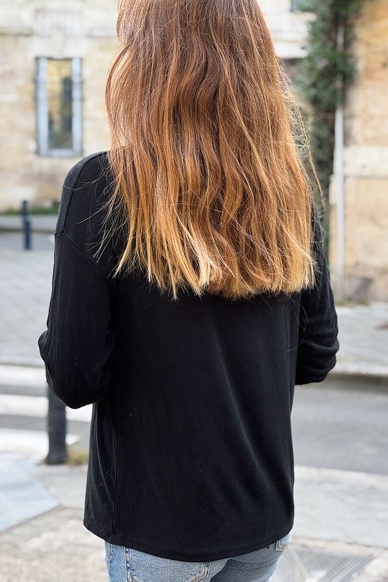Top noir en jersey stretch col v brillant