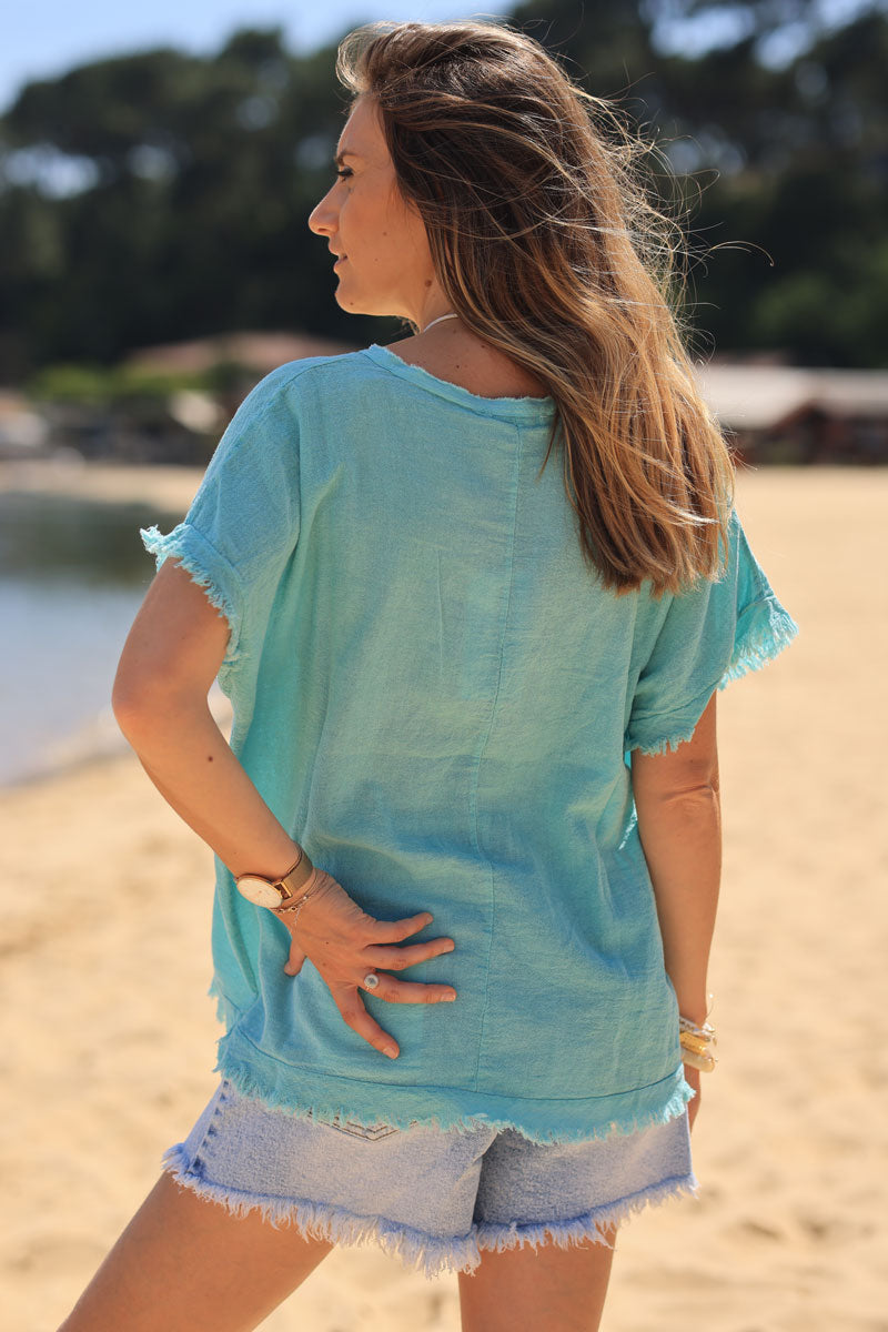 Turquoise woven cotton top with frayed hems detail