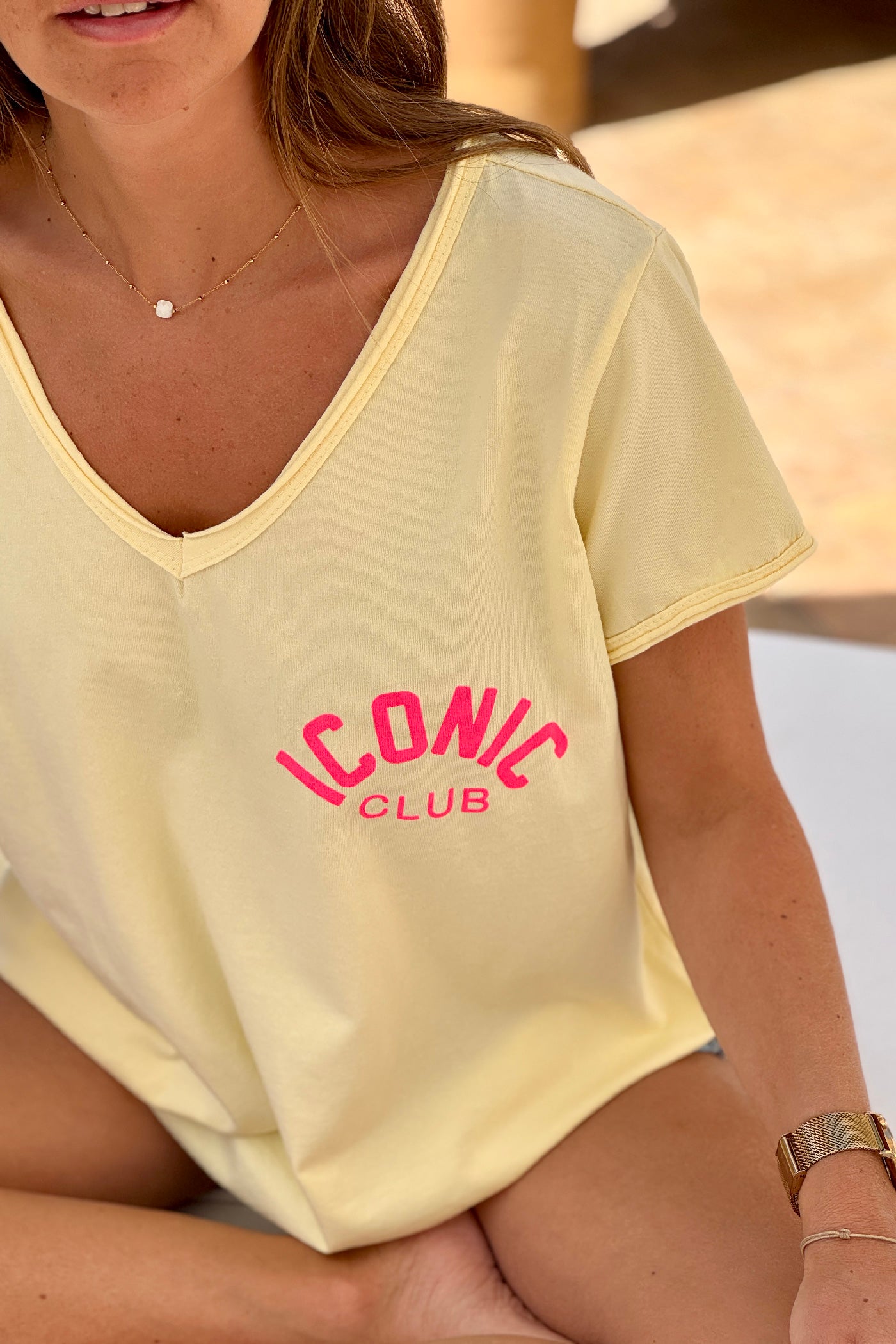 Butter Yellow “Iconic Club” V-Neck Tee