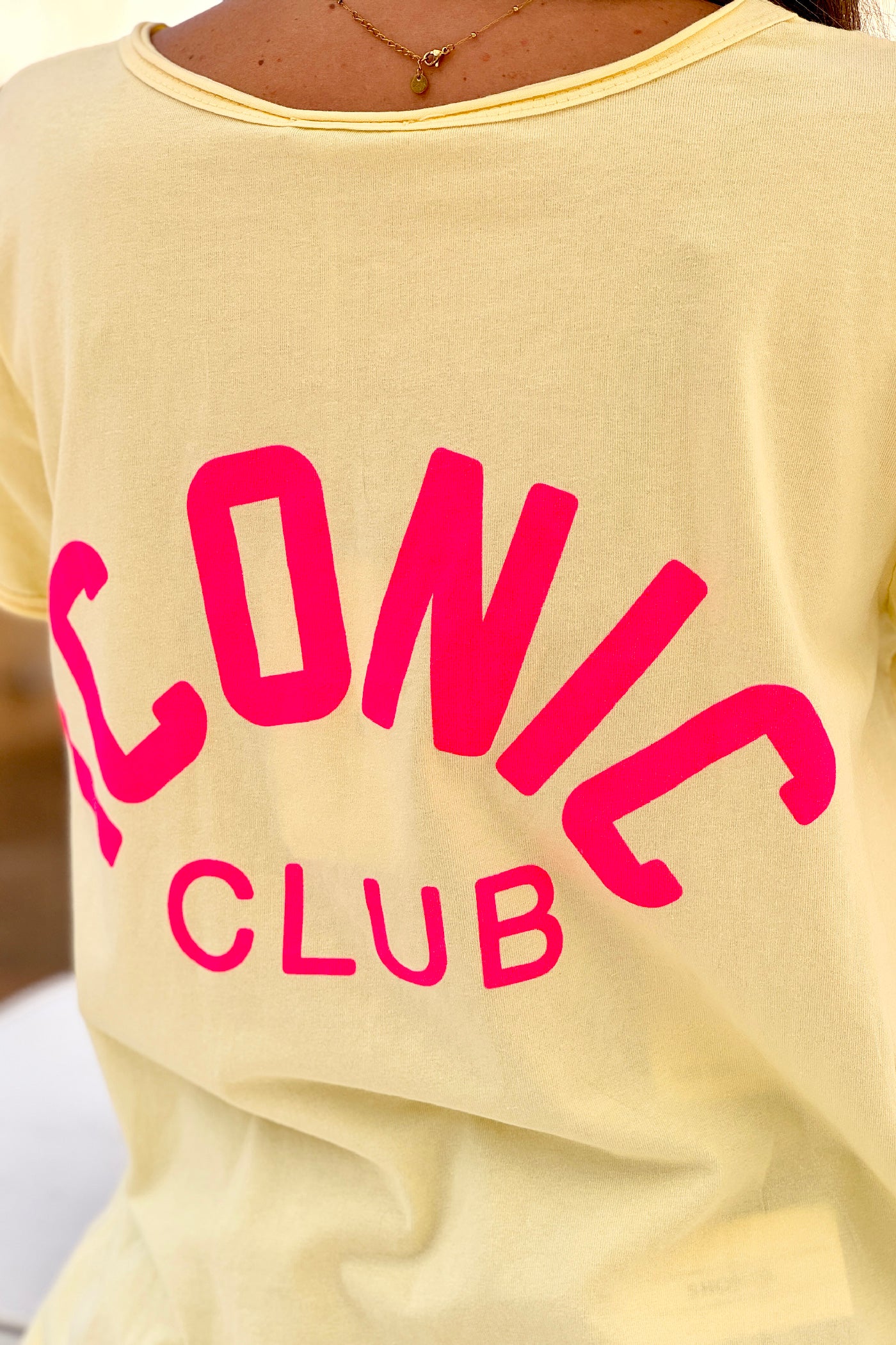 Butter Yellow “Iconic Club” V-Neck Tee
