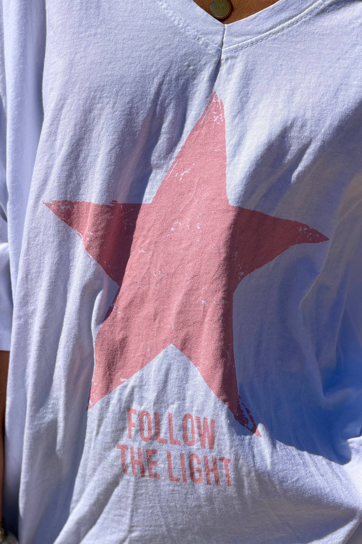 White “Follow the Light” Star Jersey Knit Top