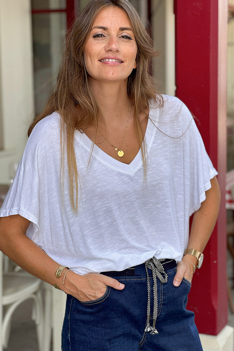 T-shirt stretch souple et large blanc chiné col v manches chauve souris