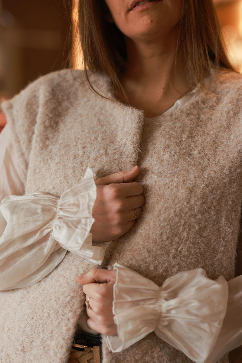 Veste sans manches beige en feutrine façon laine bouillie avec poches